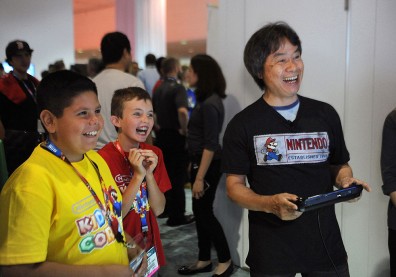  Robbie, 10, have fun playing Mario Maker (working title) for the first time with Shigeru Miyamoto, the creator of Super Mario Bros