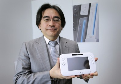  Nintendo's President Satoru Iwata displays the Wii U during E3, the Electronic Entertainment Expo, in Los Angeles